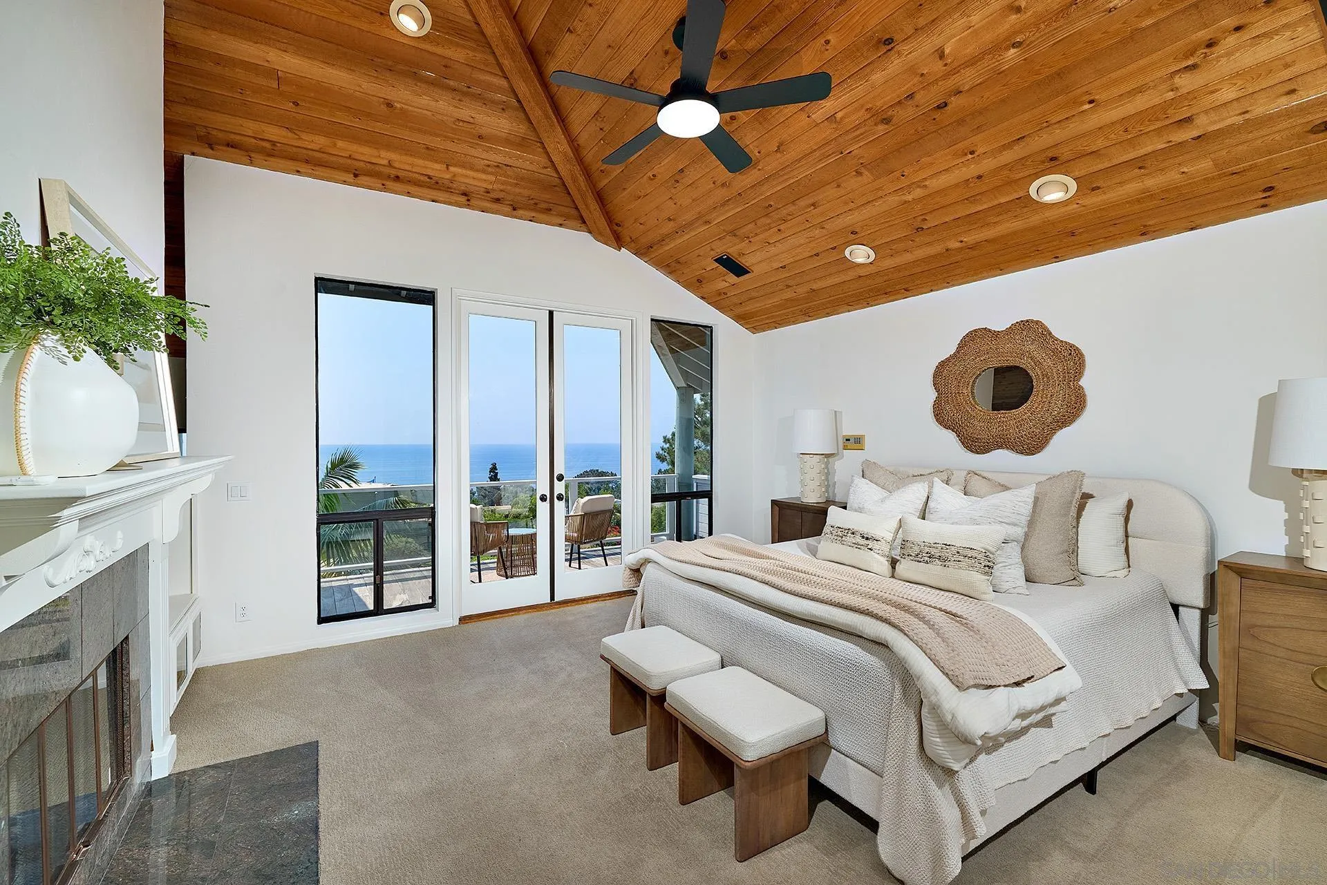 13765 Condesa Drive Del Mar, CA 92014 - Photo 60 of 75 a bedroom with a large bed and a large window with outer view