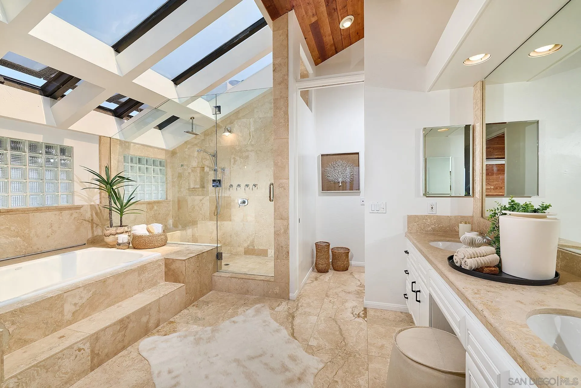 13765 Condesa Drive Del Mar, CA 92014 - Photo 66 of 75 a large bathroom with a granite countertop tub a sink and a large mirror