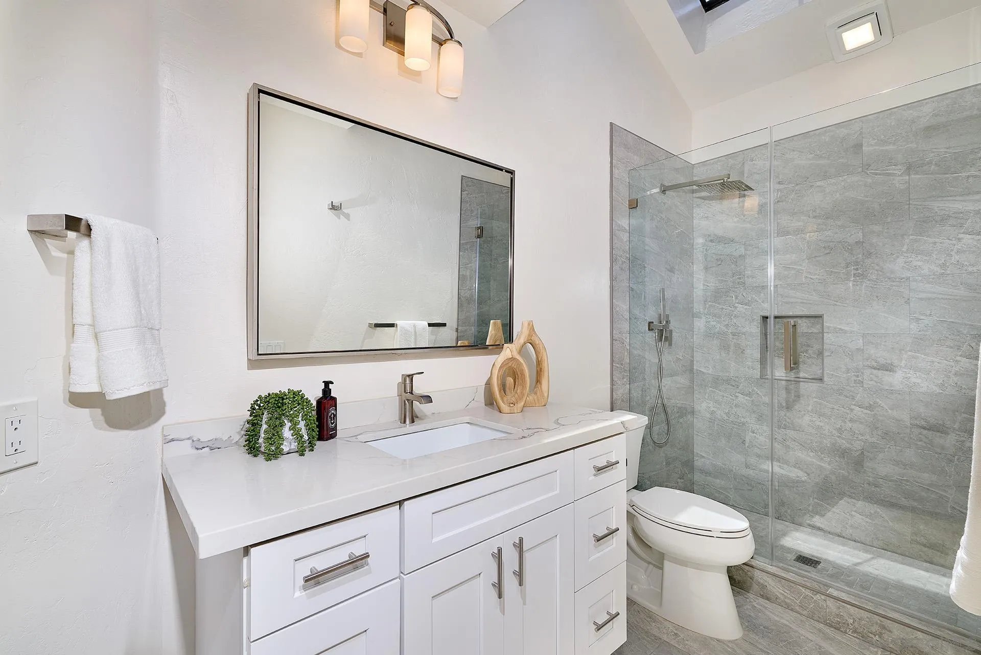 13765 Condesa Drive Del Mar, CA 92014 - Photo 70 of 75 a bathroom with a sink a toilet and shower
