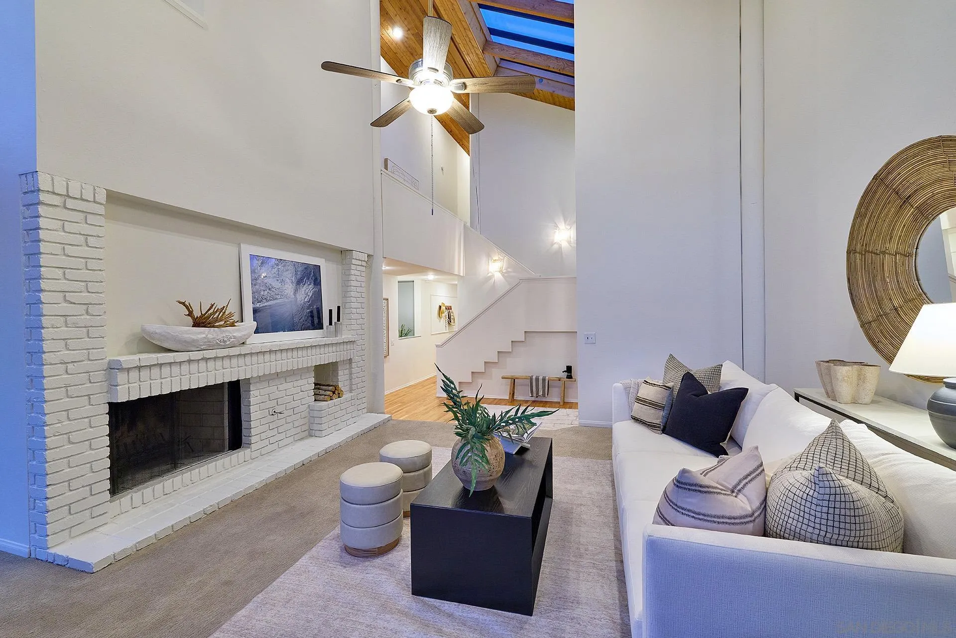 13765 Condesa Drive Del Mar, CA 92014 - Photo 10 of 75 a living room with furniture and a fireplace