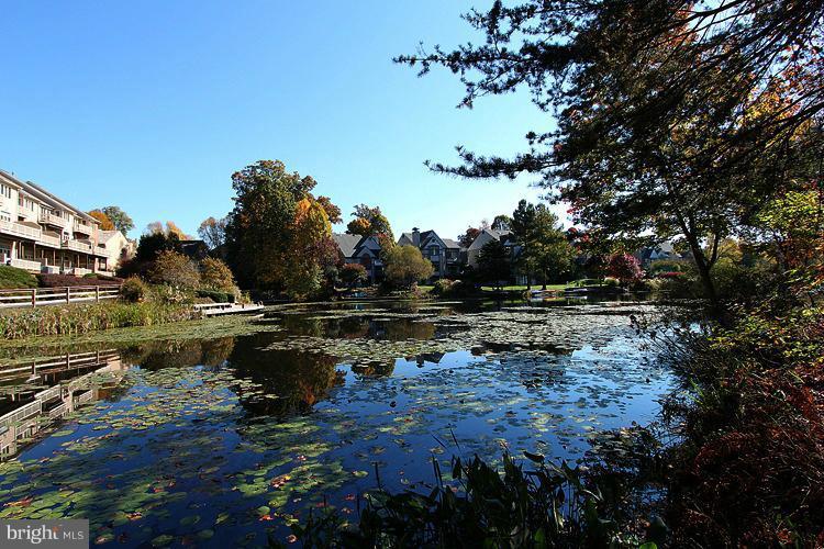 11580 Greenwich Point Road Reston, VA 20194 - Photo 3 of 30 a view of a lake with houses