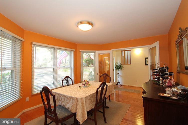 11580 Greenwich Point Road Reston, VA 20194 - Photo 6 of 30 a view of a a dining room with furniture window and outside view