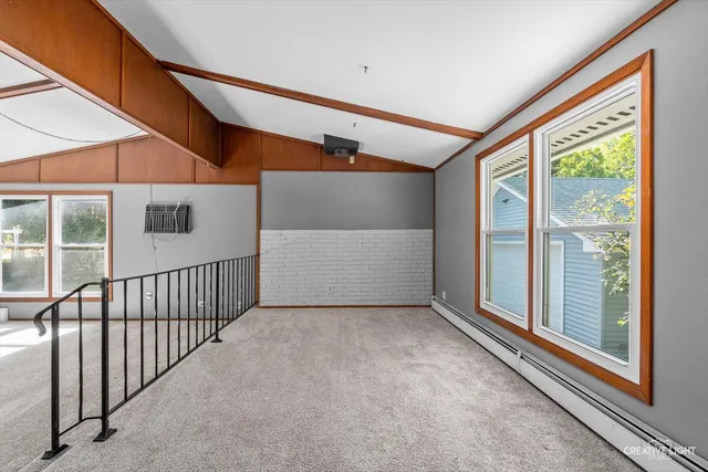a view of a livingroom with wooden floor