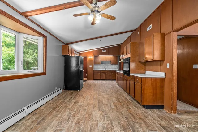 a view of a living room with a large window