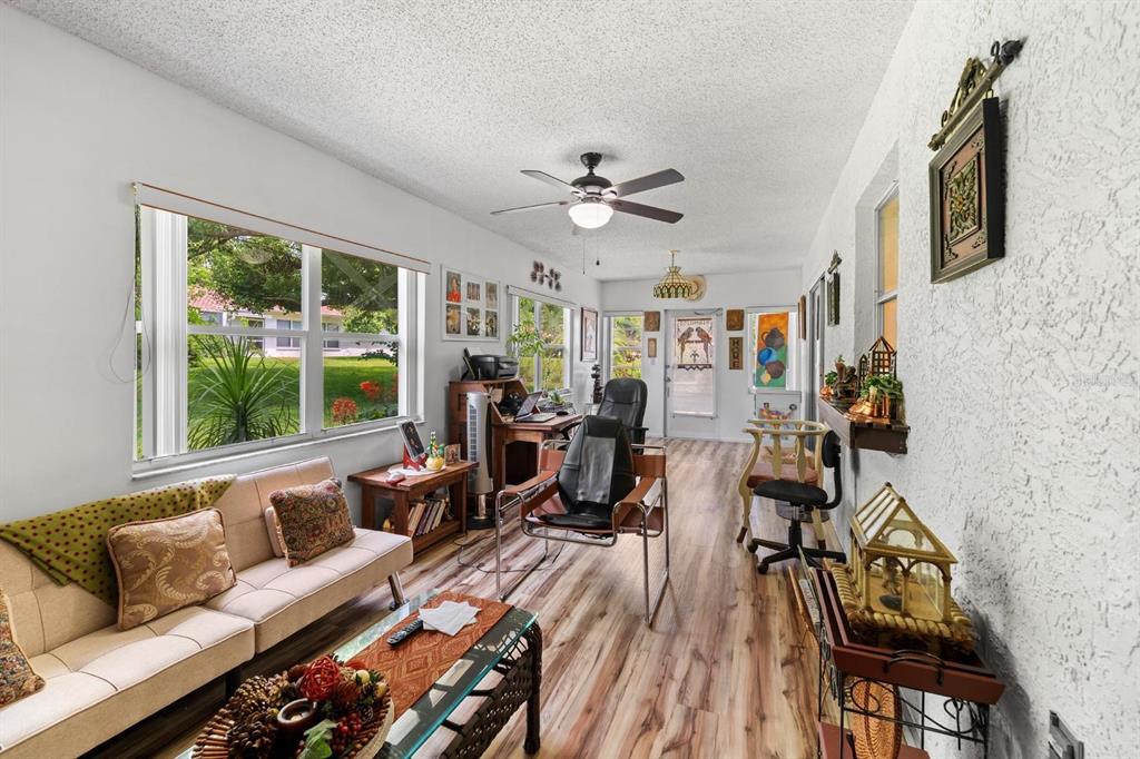 11404 Stansberry Drive Port Richey, FL 34668 - Photo 20 of 30 a living room with furniture and a large window