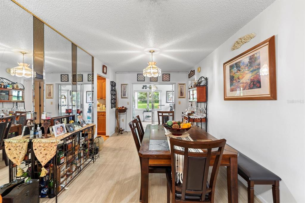 11404 Stansberry Drive Port Richey, FL 34668 - Photo 9 of 30 a dining room with furniture and window