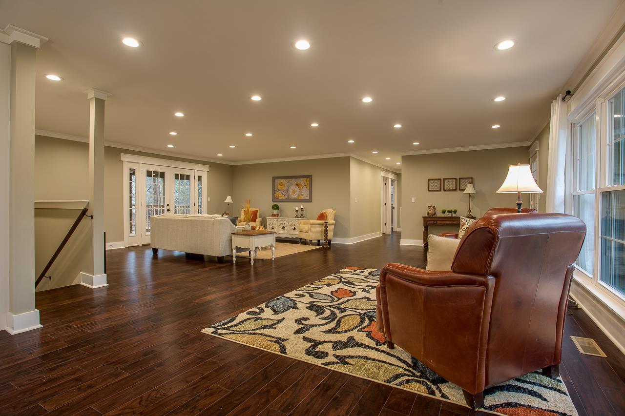 83 You Take It Road Ardmore, TN 38449 - Photo 30 of 30 a living room with furniture and a dining table with kitchen view