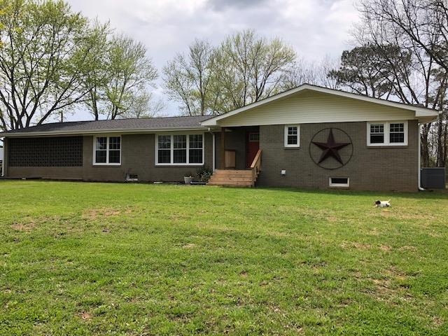 83 You Take It Road Ardmore, TN 38449 - Photo 1 of 30 a house view with a garden space