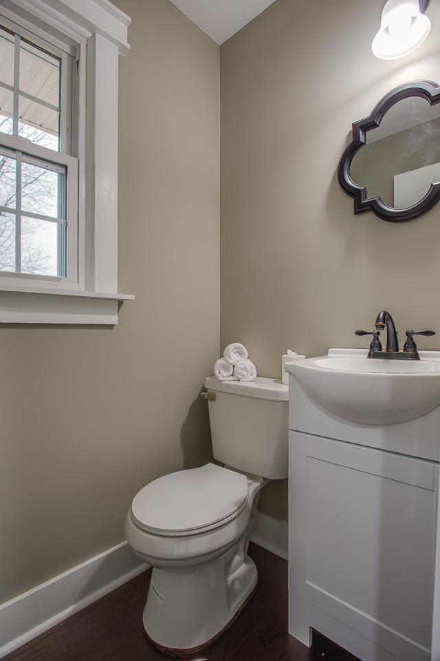 83 You Take It Road Ardmore, TN 38449 - Photo 17 of 30 a bathroom with a toilet a sink and a window