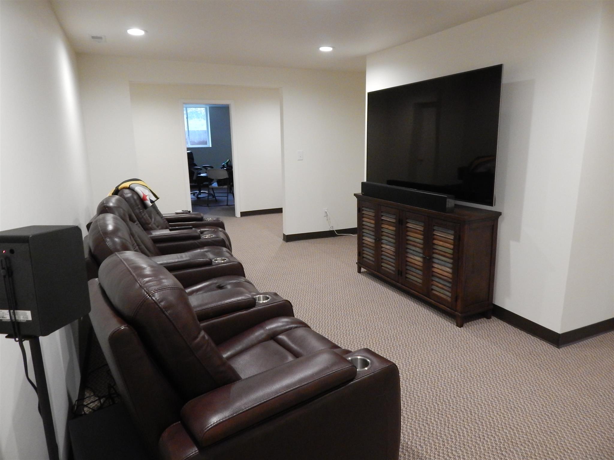83 You Take It Road Ardmore, TN 38449 - Photo 20 of 30 a living room with furniture and a flat screen tv