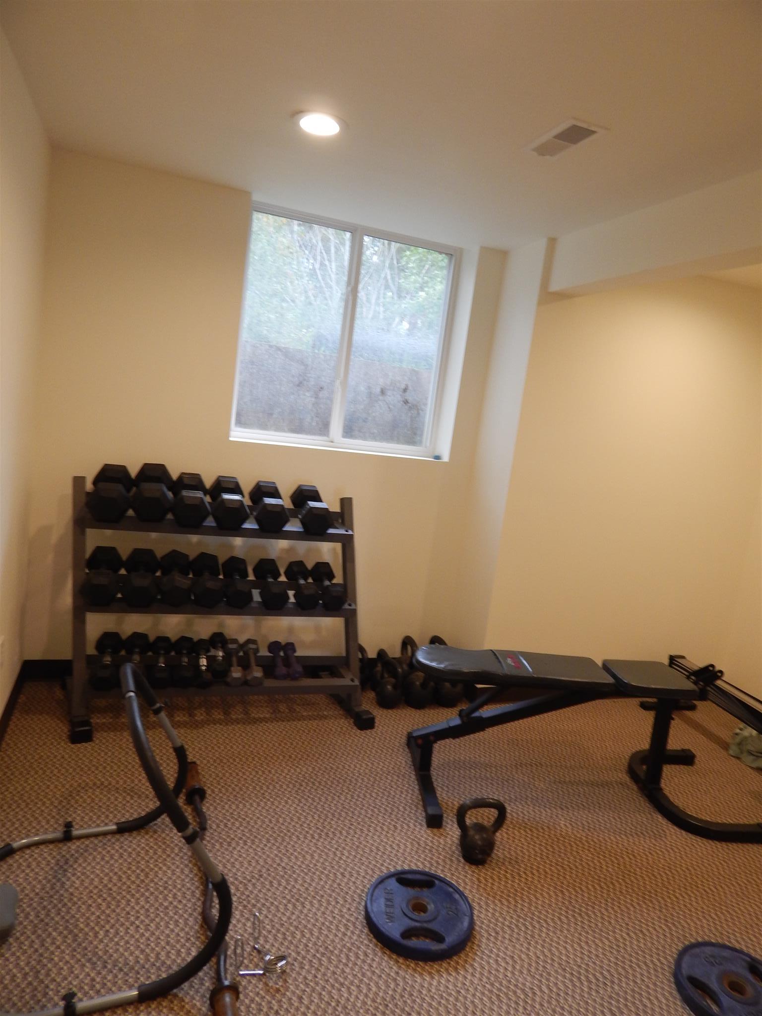 83 You Take It Road Ardmore, TN 38449 - Photo 21 of 30 a room with furniture and gym equipment