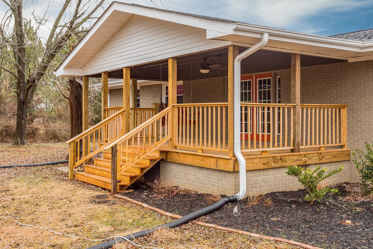 83 You Take It Road Ardmore, TN 38449 - Photo 24 of 30 a view of a house with wooden floor and fence
