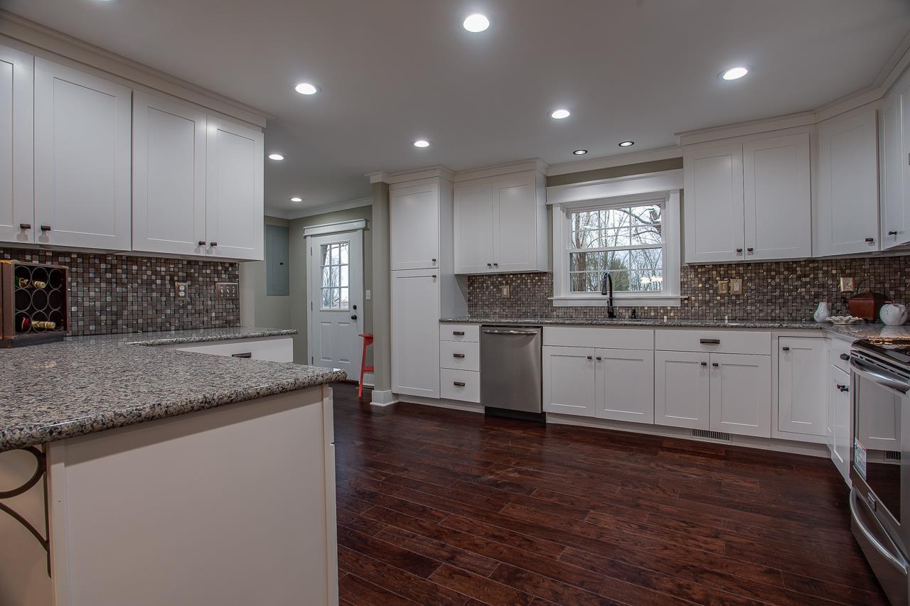83 You Take It Road Ardmore, TN 38449 - Photo 5 of 30 a kitchen with stainless steel appliances granite countertop refrigerator sink and cabinets