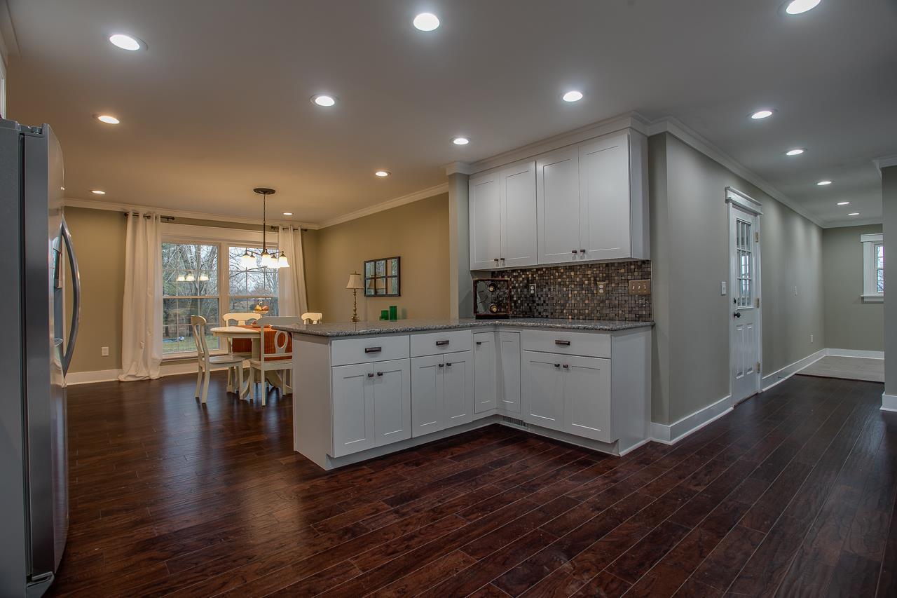83 You Take It Road Ardmore, TN 38449 - Photo 7 of 30 a open kitchen with lots of counter space and wooden floor