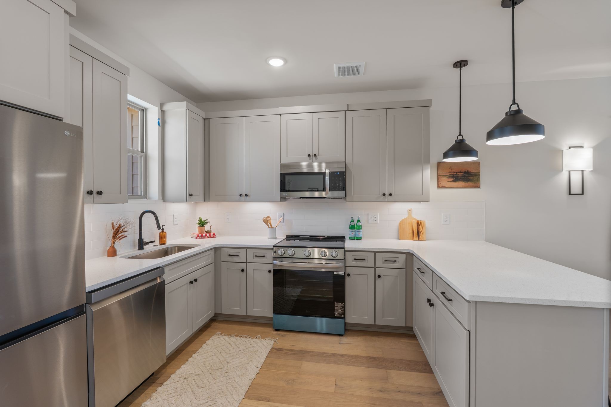 145 Whitsett Road, Unit 29 Nashville, TN 37210 - Photo 11 of 27 a kitchen with appliances cabinets and a sink