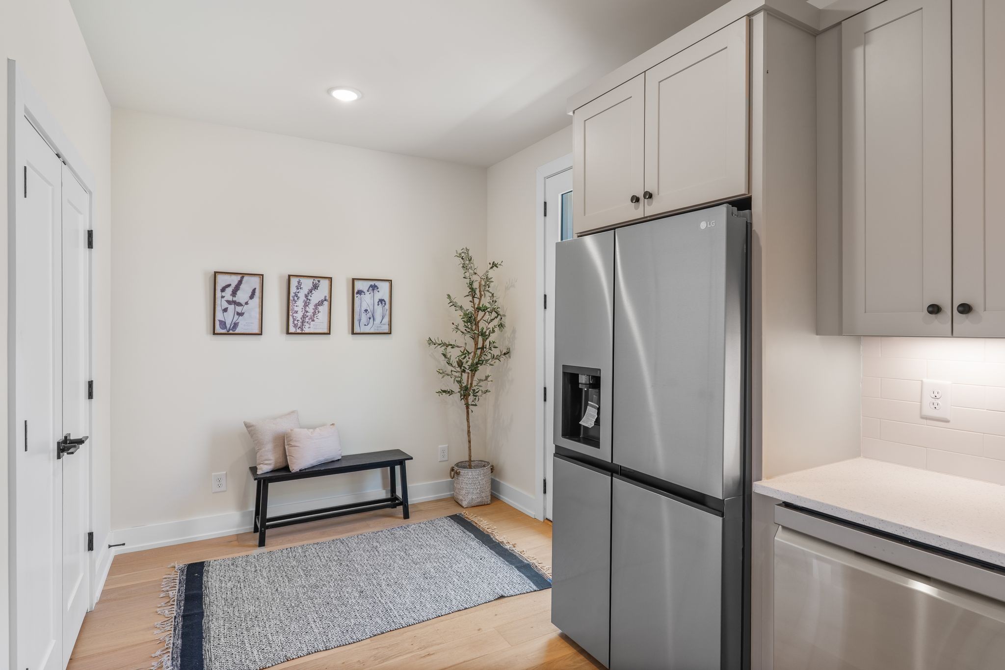 145 Whitsett Road, Unit 29 Nashville, TN 37210 - Photo 14 of 27 a kitchen with stainless steel appliances a refrigerator and a stove top oven