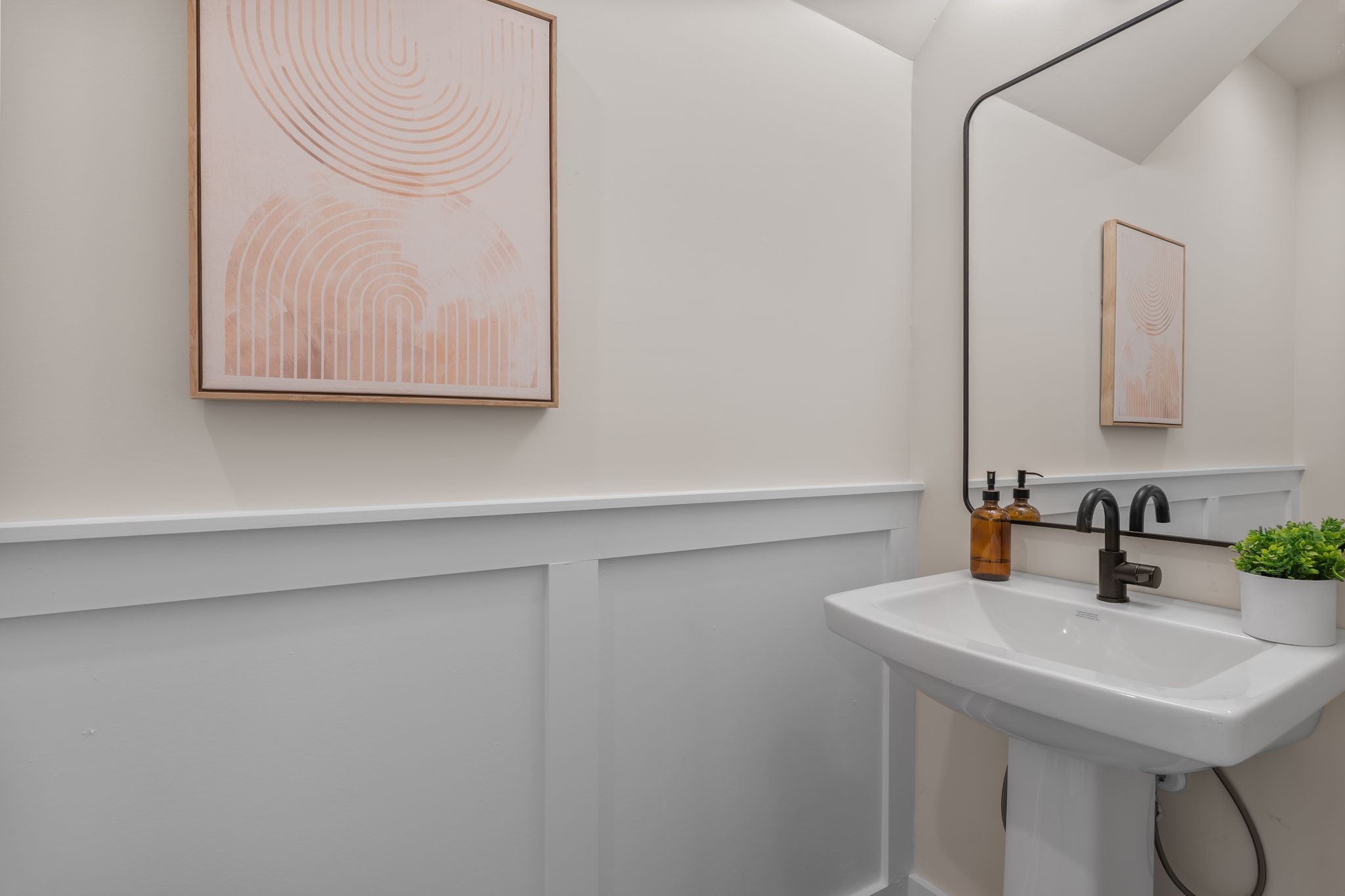 145 Whitsett Road, Unit 29 Nashville, TN 37210 - Photo 16 of 27 a bathroom with a sink and a mirror