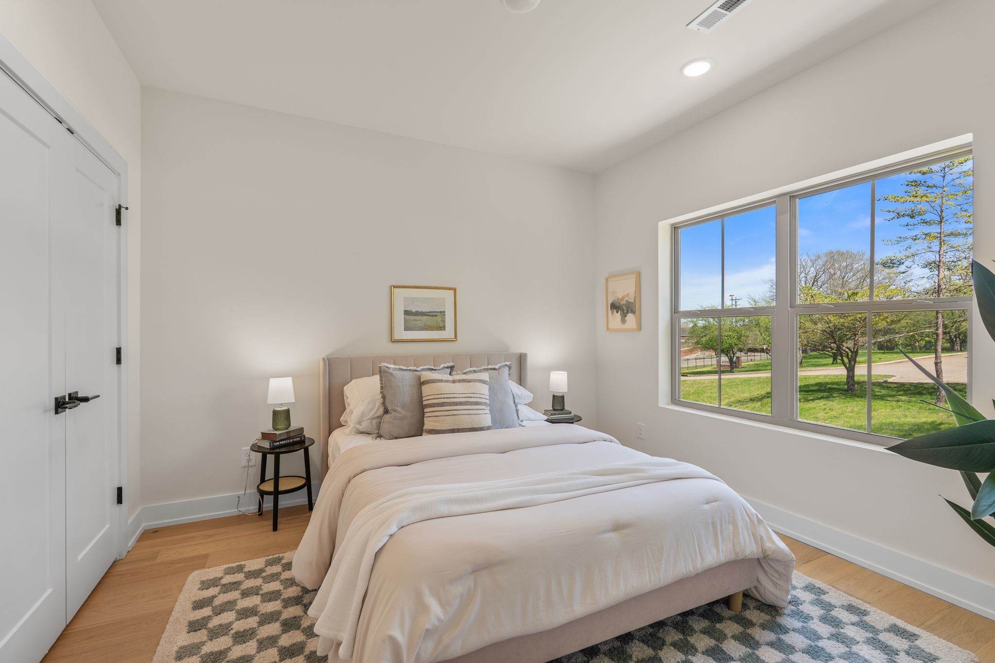 145 Whitsett Road, Unit 29 Nashville, TN 37210 - Photo 25 of 27 a bedroom with a bed and a window