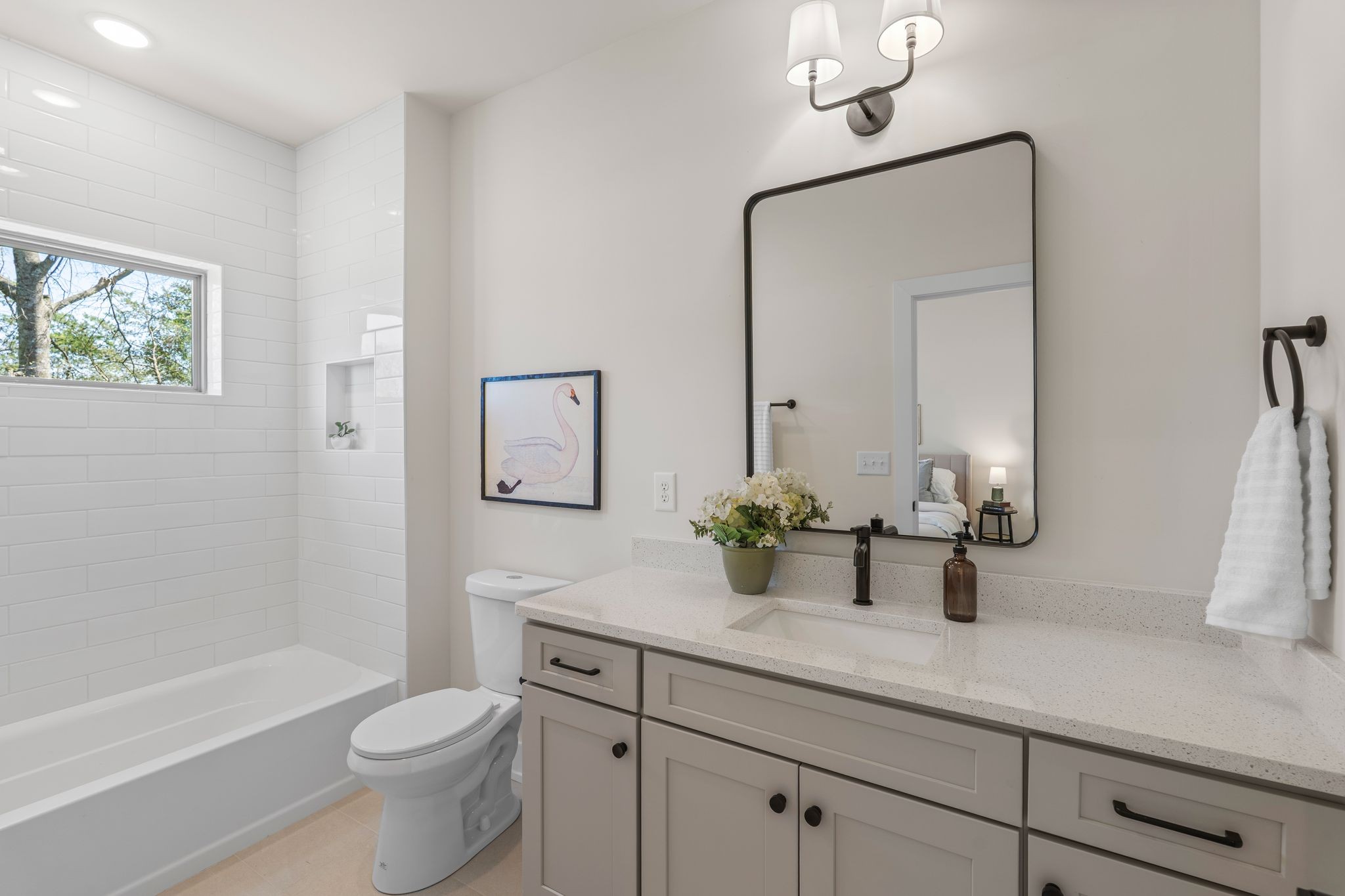 145 Whitsett Road, Unit 29 Nashville, TN 37210 - Photo 26 of 27 a bathroom with a granite countertop sink a toilet a mirror and shower
