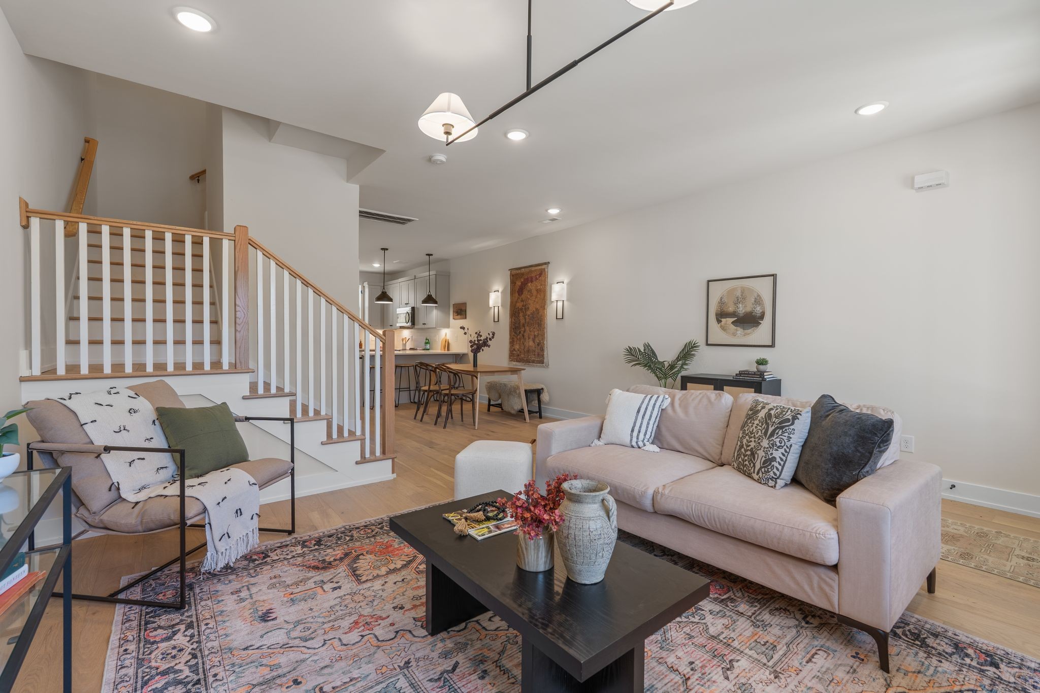 145 Whitsett Road, Unit 29 Nashville, TN 37210 - Photo 7 of 27 a living room with furniture and wooden floor
