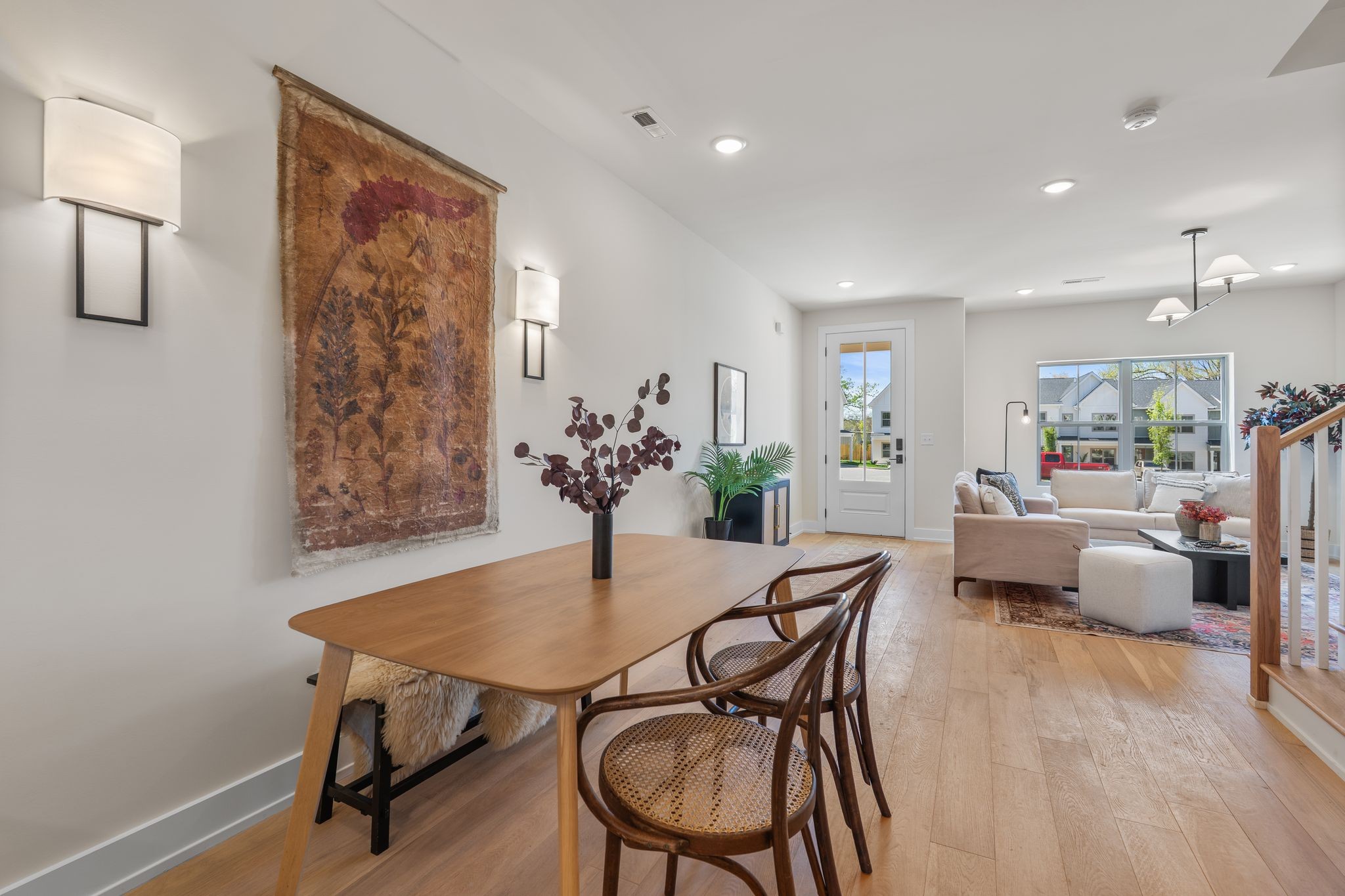 145 Whitsett Road, Unit 29 Nashville, TN 37210 - Photo 9 of 27 a view of a dining room with furniture and wooden floor