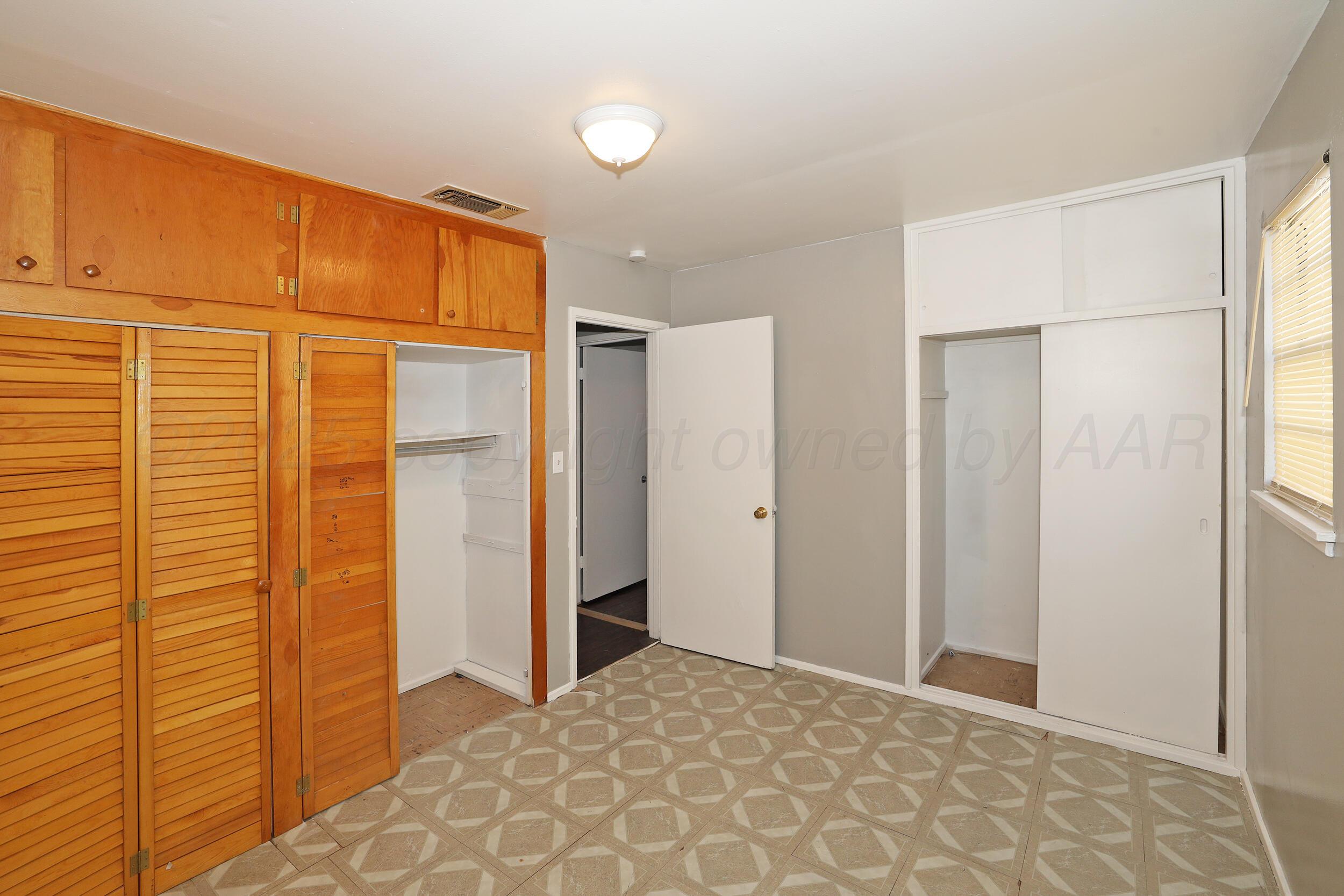 3820 Beaver Drive Amarillo, TX 79107 - Photo 12 of 24 a view of empty room with wooden floor