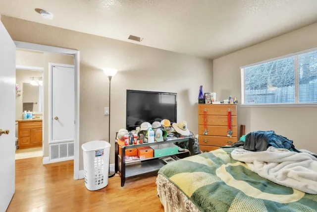 a living room filled with furniture and a table