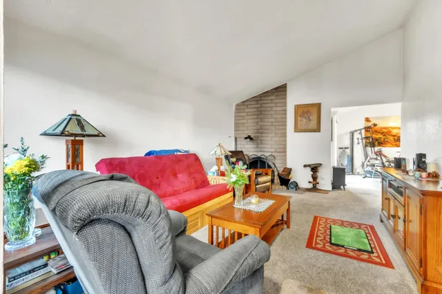 a living room with furniture and a couch