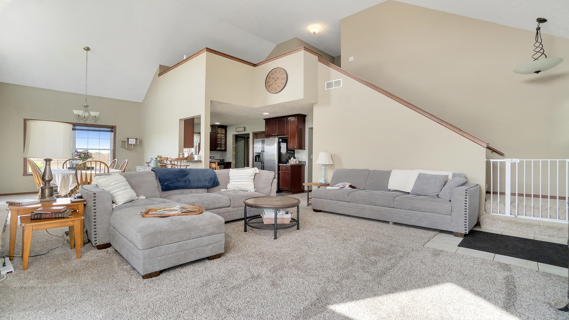 5108 North Winnebago Road Winnebago, IL 61088 - Photo 5 of 50 a living room with furniture and a large window