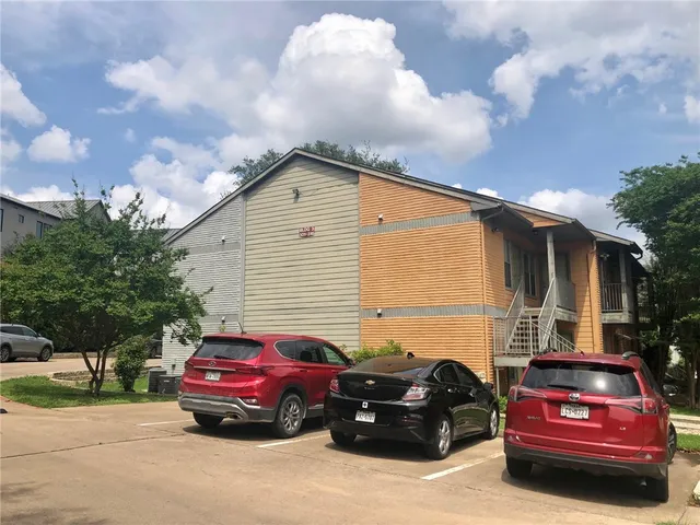 a car parked in front of a house