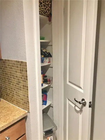 a view of a bedroom with closet