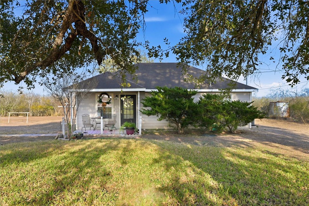 3260 Highway 281 George West, TX 78022 - Photo 1 of 34 a front view of house with yard and outdoor seating