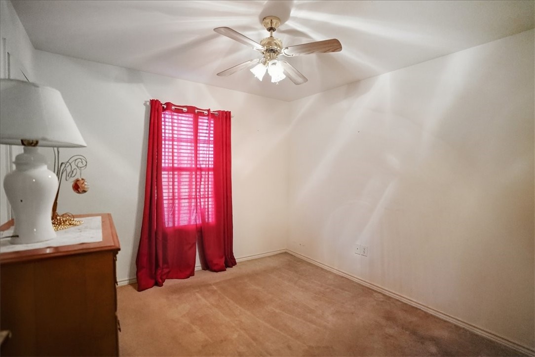 3260 Highway 281 George West, TX 78022 - Photo 12 of 34 a view of a room with window and a ceiling fan