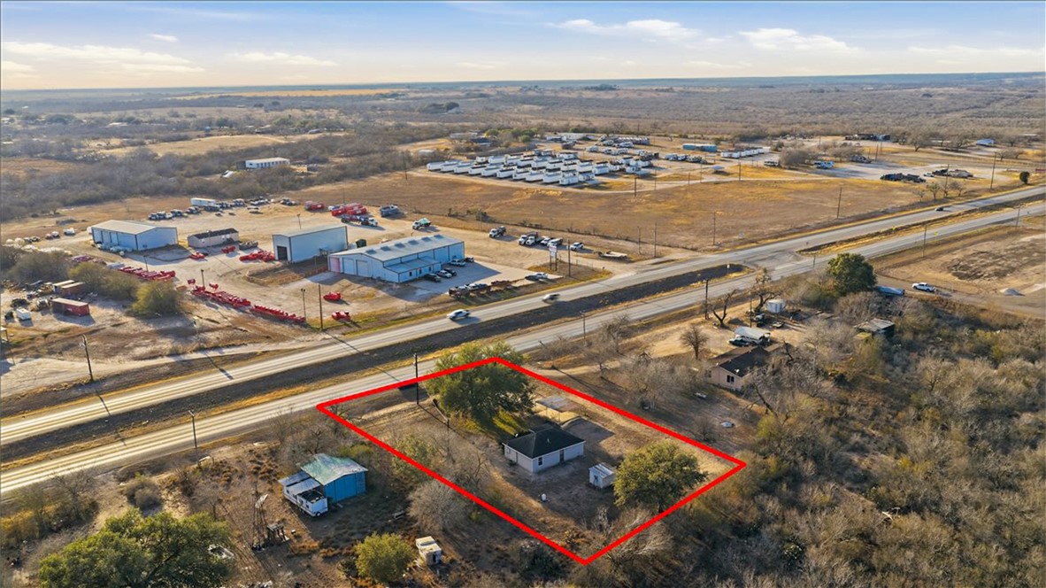 3260 Highway 281 George West, TX 78022 - Photo 24 of 34 an aerial view of residential houses with outdoor space