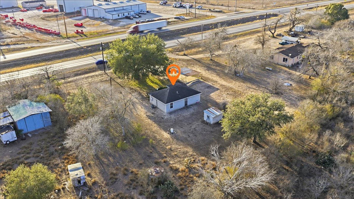 3260 Highway 281 George West, TX 78022 - Photo 31 of 34 a view of a yard with plants and wooden bench