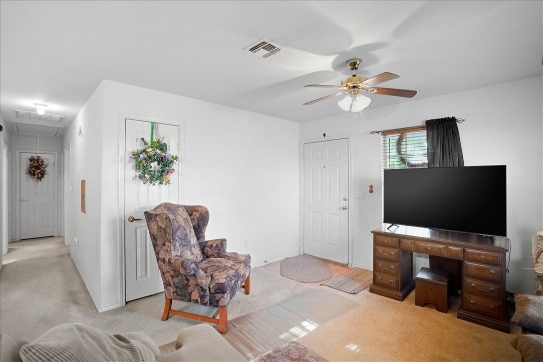 3260 Highway 281 George West, TX 78022 - Photo 4 of 34 a living room with furniture and a flat screen tv