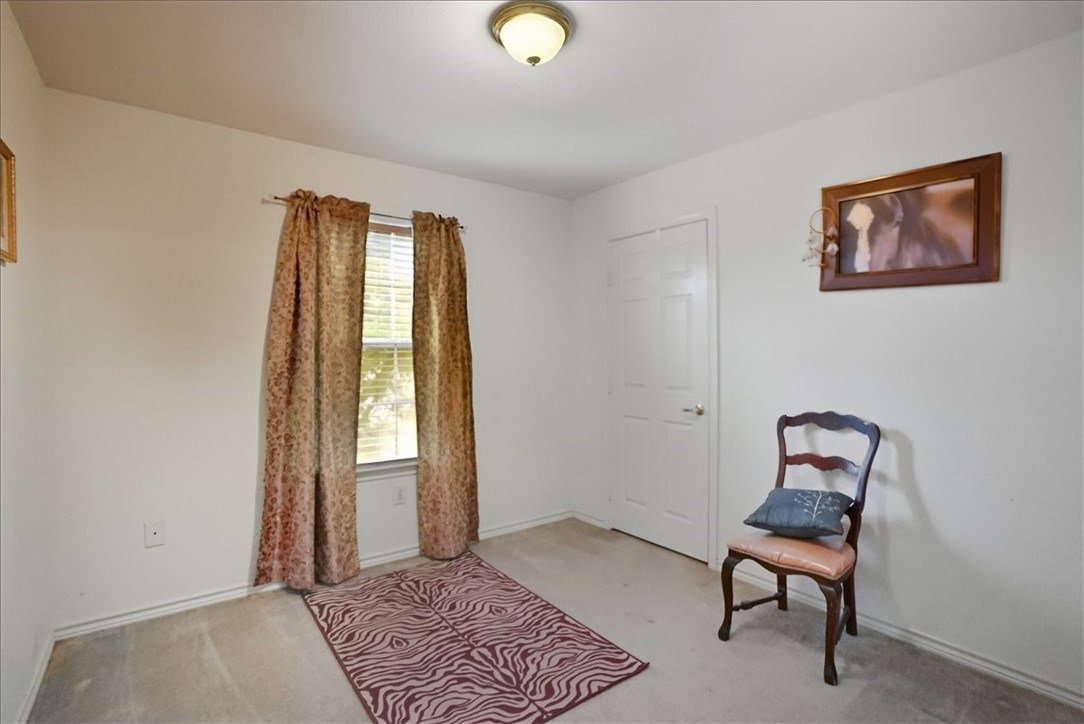 3260 Highway 281 George West, TX 78022 - Photo 10 of 34 a bedroom with a bed and a window