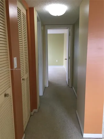 a bathroom with a bathtub and a sink