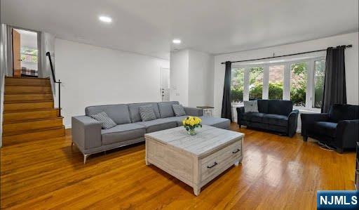 10 Center Street Cresskill, NJ 07626 - Photo 2 of 8 a living room with furniture and a large window