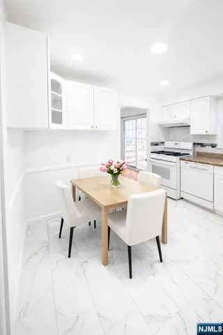 a view of kitchen with breakfast area