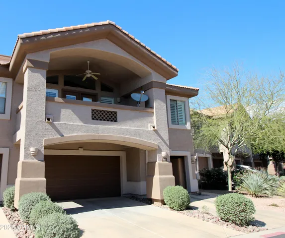 a view of a house with a garage