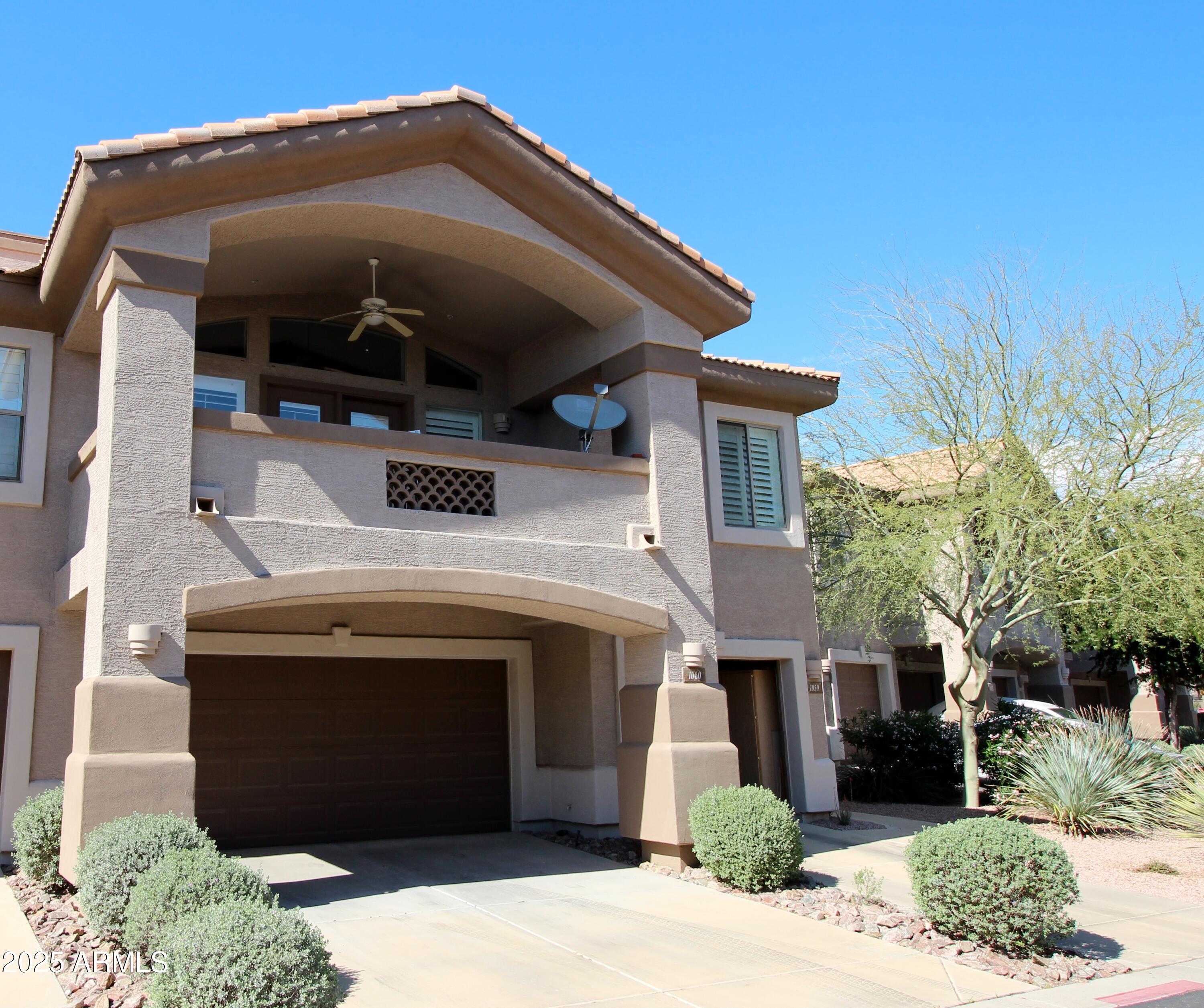a view of a house with a garage