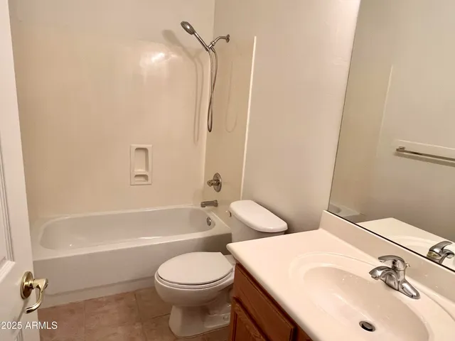 a bathroom with a sink a toilet and a bathtub