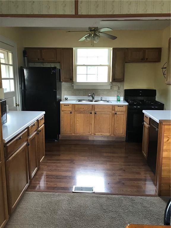 38 Forest Road Ambridge, PA 15003 - Photo 2 of 23 Kitchen with back door and ample cabinetry.
