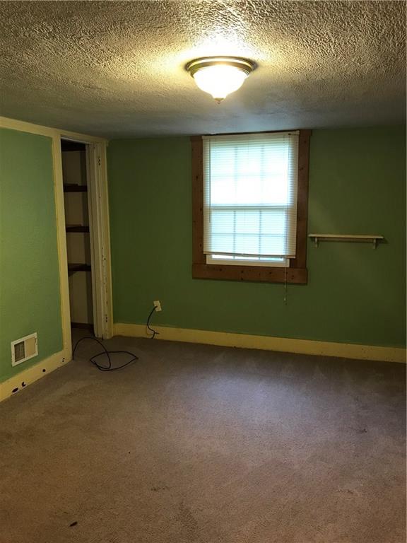 38 Forest Road Ambridge, PA 15003 - Photo 12 of 23 lower level room could be used as an additional bedroom, family room or nursery