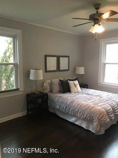 1674 Charon Road Jacksonville, FL 32205 - Photo 5 of 6 a bedroom with a bed and a window