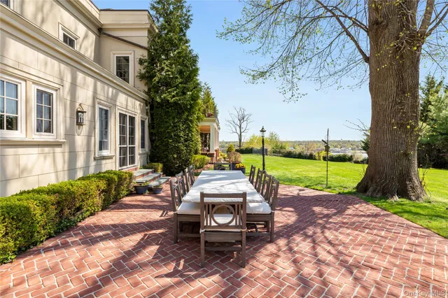 a view of a patio with a garden