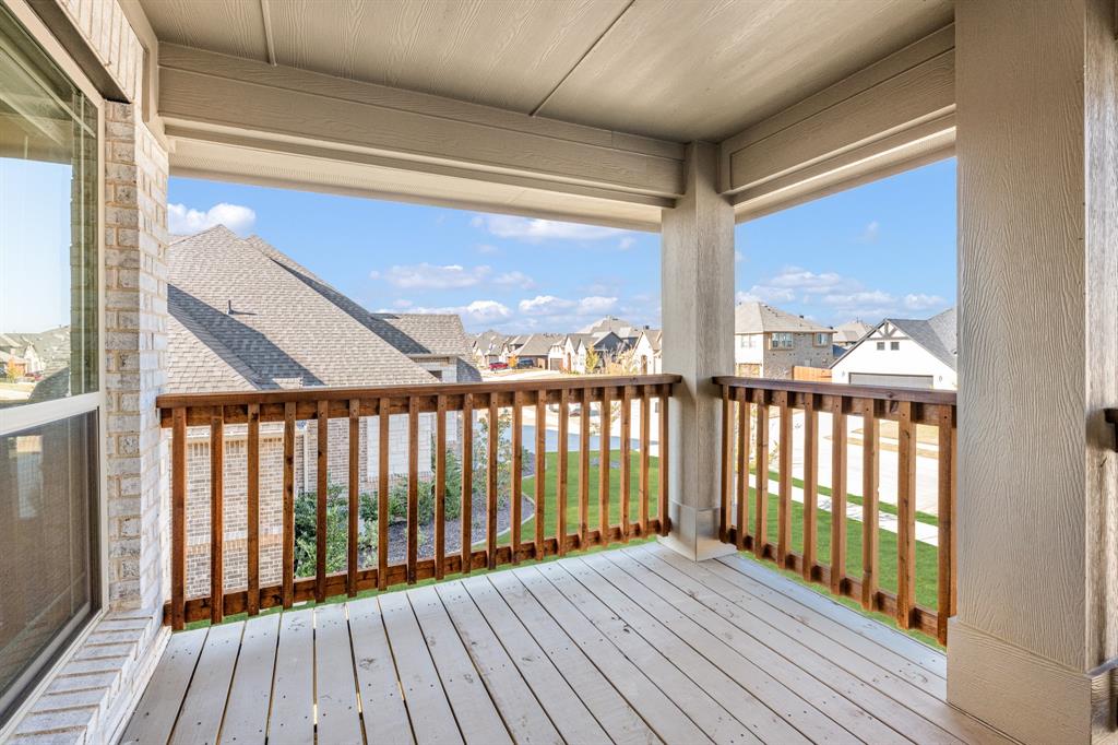 2401 Rileigh Lane Mansfield, TX 76063 - Photo 27 of 40 a view of balcony with wooden floor