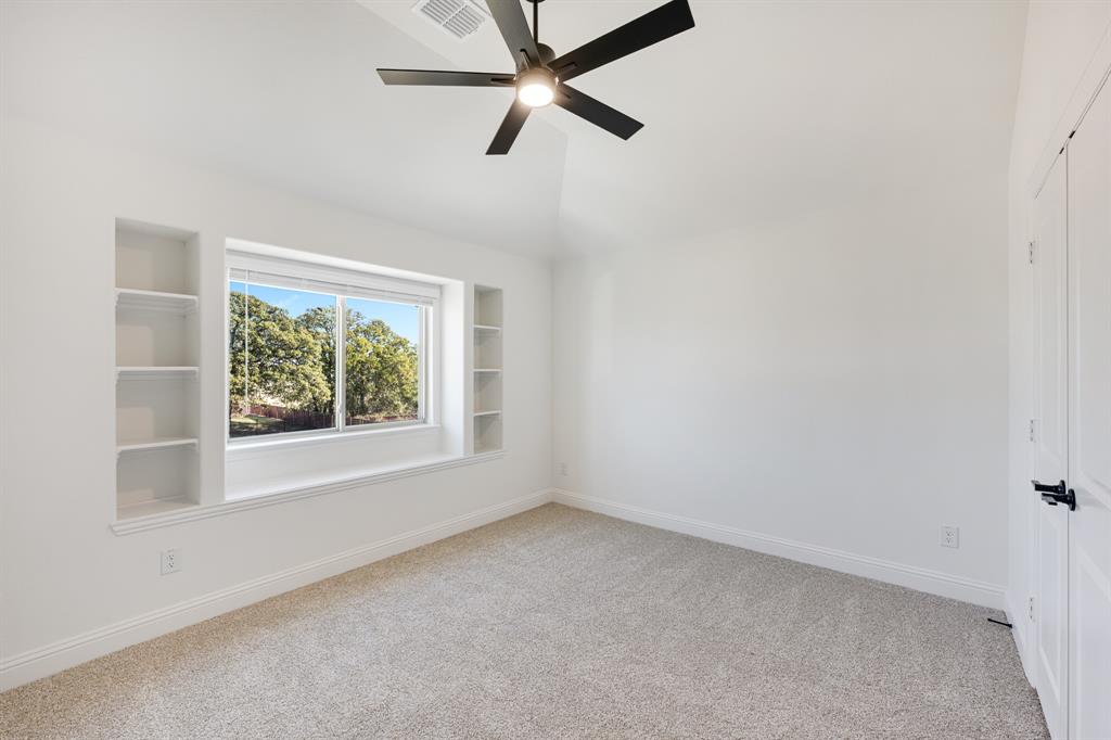 2401 Rileigh Lane Mansfield, TX 76063 - Photo 34 of 40 an empty room with a window