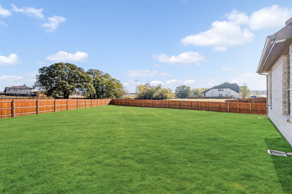 2401 Rileigh Lane Mansfield, TX 76063 - Photo 38 of 40 a view of yard with swimming pool and green space